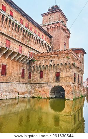 The Impregnable Castello Estense Surrounded With Wide Dug Moat And Supplement With High Towers And R