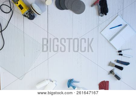 Industrial, Workshop Background With Mechanic And Electric Tools, Gloves, Glass, Plastic Bottles And