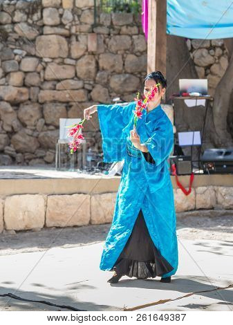 Jerusalem, Israel, September 29, 2018 : Dancer In National Japanese Attire Dancing Japanese Dance At