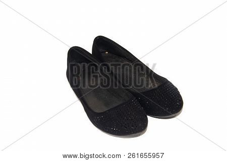 Black Ballet Flats On Female Legs On A White Background. Women's Summer Footwear. Business Black Bal