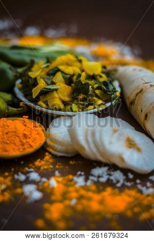 Close Up Of Popular Indian & Asian White Radish Salad Or Muli Ka Smabara On Wooden Surface With Whit