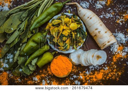 Close Up Of Popular Indian & Asian White Radish Salad Or Muli Ka Smabara On Wooden Surface With Whit