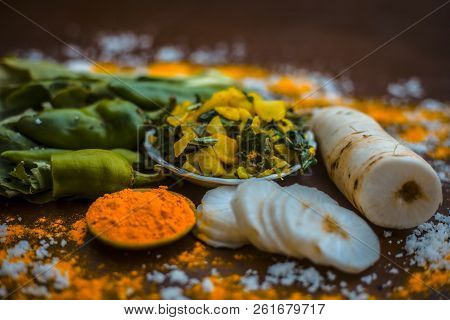 Close Up Of Popular Indian & Asian White Radish Salad Or Muli Ka Smabara On Wooden Surface With Whit