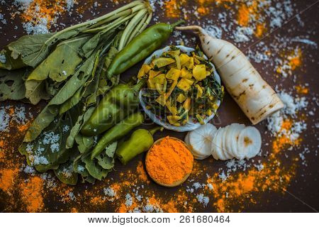 Close Up Of Popular Indian & Asian White Radish Salad Or Muli Ka Smabara On Wooden Surface With Whit