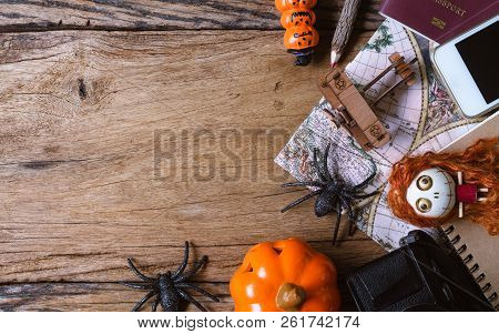 Planning Halloween Destination Travelling Concept. Top View  With Copy Space Of Happy Halloween Toys