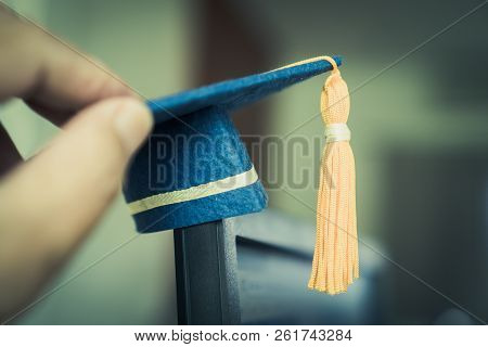 Graduation Cap On Hands Show Success In Education Learning Study International Abroad 
With Blur Stu