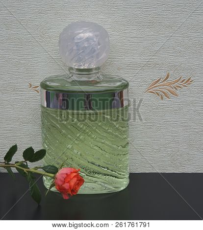 Fragrance For Ladies, Large Perfume Bottle In Front Of The Satin Wallcovering Elysee Decorated With 