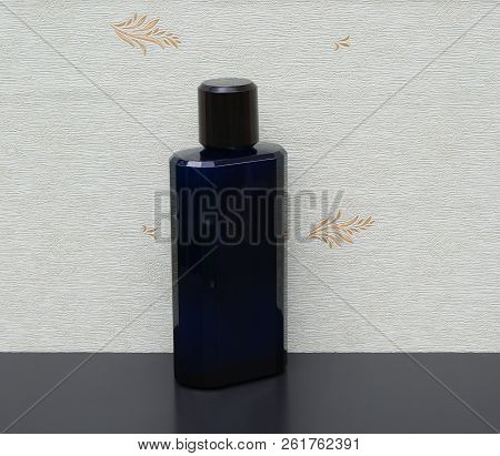 Eau De Toilette, Large Perfume Bottle In Front Of The Satin Wallcovering Elysee