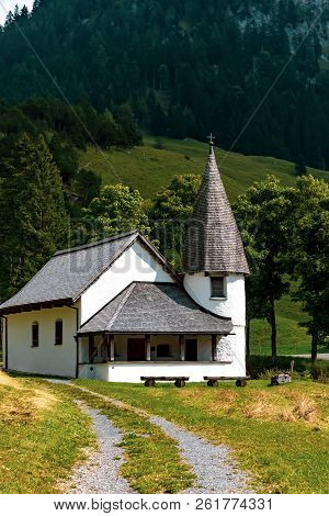 Steg, Liechtenstein, 20th August 2018:- The Small Church In The Central Village Of Steg On The Road 