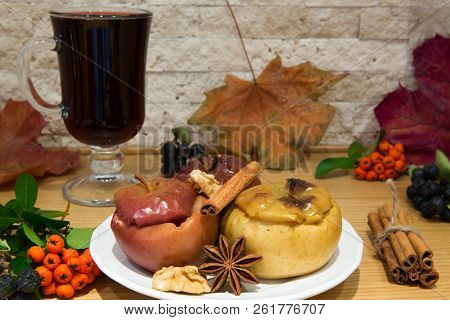 Hot Mulled Wine With Low Fat Healthy Dessert: Baked Apples With Cinnamon And Brown Sugar, Decorated 