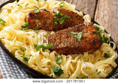 Chicken Lazone With Perfectly Seasoned Pan Fried Chicken In A Luscious Creamy Sauce With Fettuccine