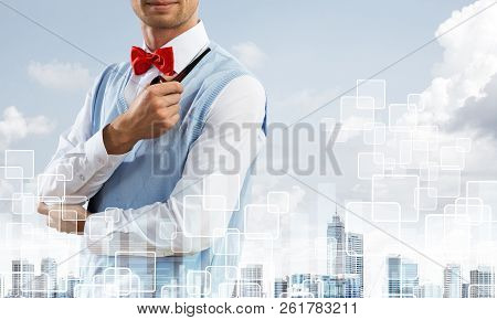 Double Exposure Of Confident And Young Businessman In Smart-casual Wear Smoking Pipe And Modern City