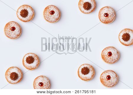 Jewish Holiday Hanukkah Sufganiyot On White Background. Top View From Above
