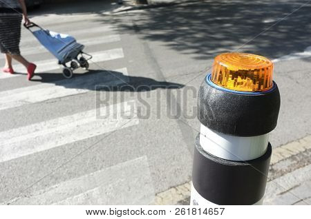Pedestrian Crossing Traffic Pole For Blind People. Emerging Lighting On Ground And Auditive System