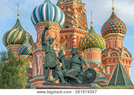 Statue Of Minin And Pozharsky On The Red Square In Moscow Russia. Saint Basil Cathedral On The Backg