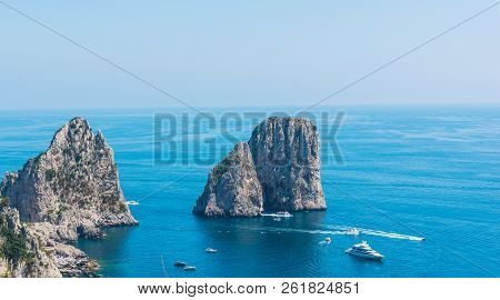 Famous Capri Sea Stack On A Sunny Day. Campania, Italy