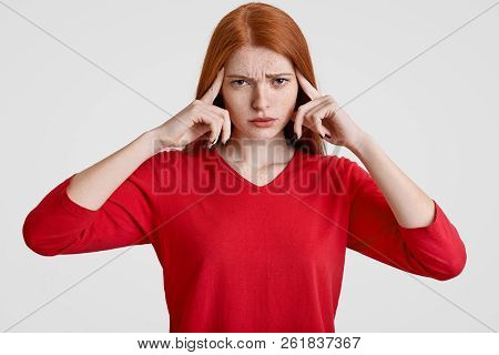 Negative Human Facial Expressions Concept. Stressful Overworked Foxy Female Has Freckled Face, Keeps