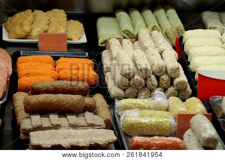 Various Sorts Of Raw Snacks On Display In A Fast Food Restaurant