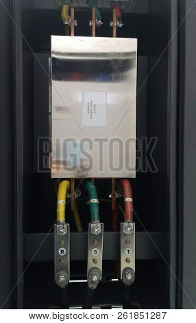 Electrical Parts And Mechanical Parts On Big Gear And Drum Rolls On White Floor