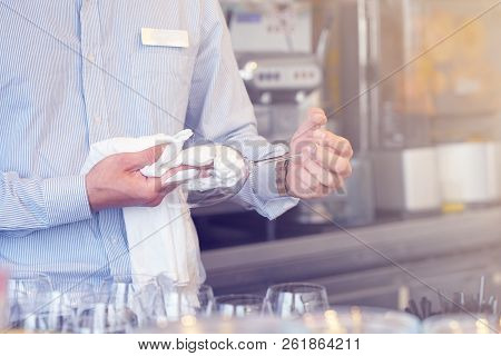 The Bartender Wipes The Wine Glasses. The Waiter Wipes The Wine Glasses. The Bartender Cleans The Gl