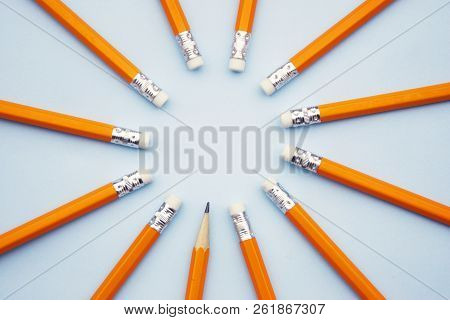 Mock Up Ready For Adding Text. Business Or Educational Concept. Yellow Pencils On Blue Background. I