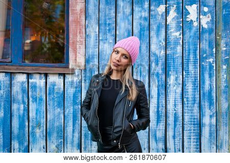 Portrait Female Student On Bright Background. Beautiful Modern Urban Young Woman Wearing Pink Knitti