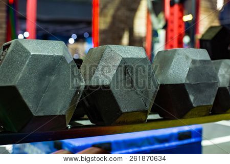 Black Rubber Dumbbells. Hexagonal Heavy Duty Weight Set Used For Serious Hardcore Gym Workouts, Cros
