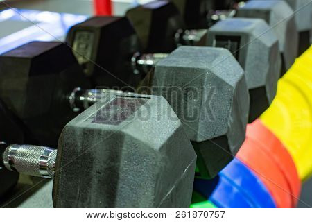 Black Rubber Dumbbells. Hexagonal Heavy Duty Weight Set Used For Serious Hardcore Gym Workouts, Cros