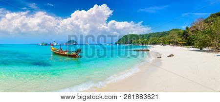 Panorama Of Traditional Long Tail Boat On Coral (ko He) Island Near Phuket Island, Thailand In A Sum