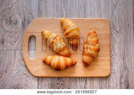 A Rich Variety Of Food Photography Croissant.
Delicious Croissants On A Square White Plate On A Wood