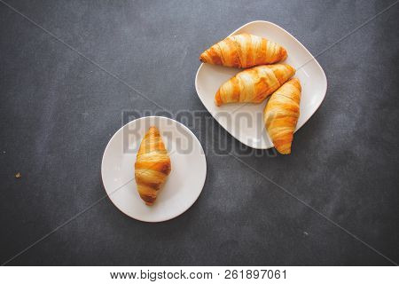 A Rich Variety Of Food Photography Croissant.
One Delicious Croissant On A Dessert White Plate On Da