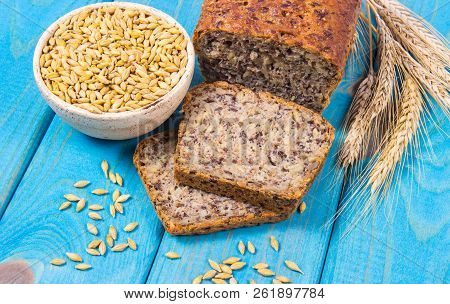 Multi-grain Bread On A Wooden Background. Healthy Food Concept.
