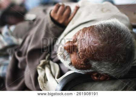 An Old Man Sleeping On A Bench At Karachi Cantt Station - 17-03-2013