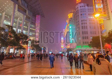 Shanghai/china -  January 24 2015: Night Life Of People Walking In Nanjing Road Walking Street In Sh