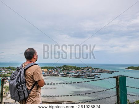 Asisn Fat Backpacker Stand On Top Of  Khao Ma Jor Pier  With Idyllic Ocean Beautiful White Cloud End