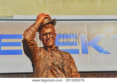 Hustopece, Czech Republic - October 7, 2018: Cupreous Painted Artist Like Living Statue Dressed Like
