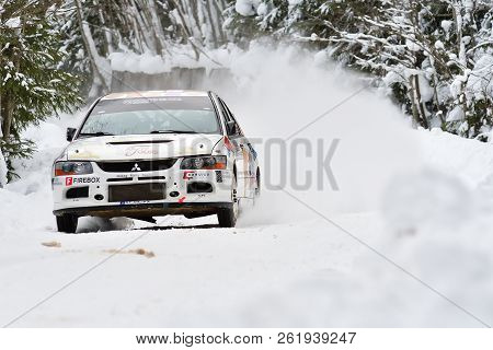 Covasna, Romania - January 14-15, 2017: Unknown Pilots Competing In Winter Rally Covasna 2017 On Jan