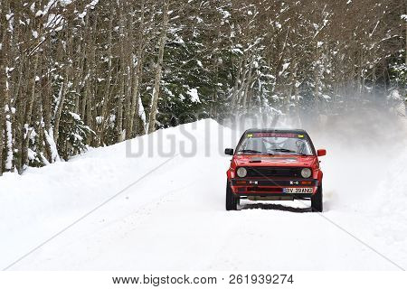 Covasna, Romania - January 14-15, 2017: Unknown Pilots Competing In Winter Rally Covasna 2017 On Jan