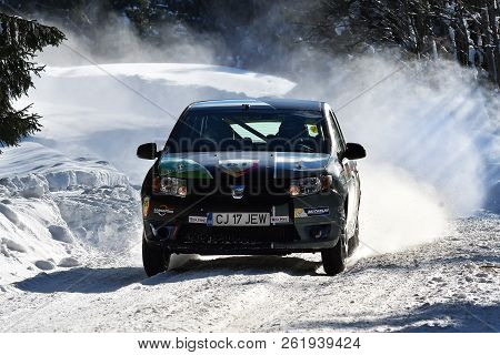Covasna, Romania - January 14-15, 2017: Unknown Pilots Competing In Winter Rally Covasna 2017 On Jan