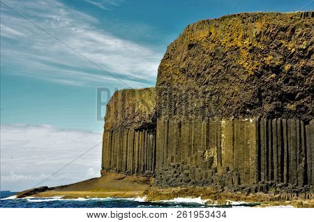 A View Of The Prehistoric Volcanic Geological Rock Formations On The Scottish Island Of Staffa