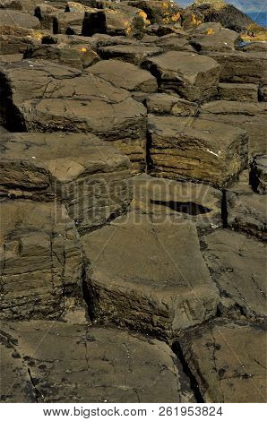 A View Of The Prehistoric Volcanic Geological Rock Formations On The Scottish Island Of Staffa