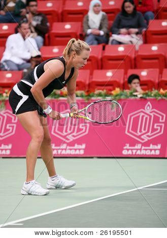 Australske tennisstjerne Alicia Molik i aktion mod Justine Henin, på i Qatar Total Open, Doha, 