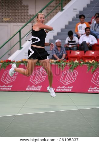 Australske tennisstjerne Alicia Molik i aktion mod Justine Henin, på i Qatar Total Open, Doha, 