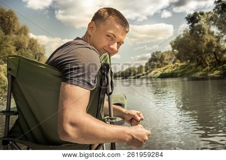 Cheerful Strong Man Teenager Lifestyle Portrait On River Pier Deck During Summer Traveling Camping H