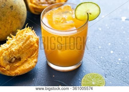 Exotic Fruit Juice From Bel Fruit Or Wooden Apple Called In India Bel Ka Sharbat. Cold Fruit Drink W