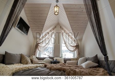 Interior Of A Modern House Spacious Hallway With Big Soft Resting Place. Contemporary Wide Sofa With