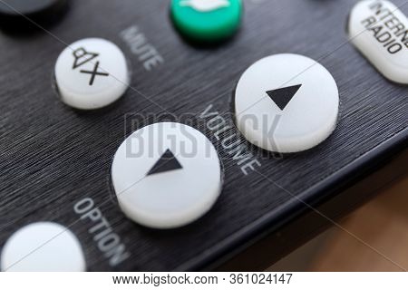 A Close Up Portrait Of The Volume Up And Down Buttons On A Radio, Television Or Surround Sound Syste