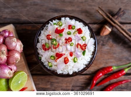 Brow Rice Spicy Asian Food With Vegetable And Chopstic On Wooden Background