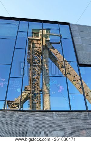 Headframe Of C-mine In Belgium Reflected In Glass