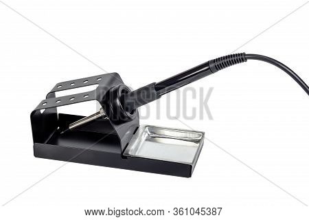 Electric Soldering Iron On A Stand. Isolated On A White Background.